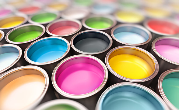 paint buckets with focus on cmyk paint