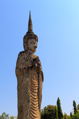 Fototapeta na wymiar old Buddha statue of Thai temple,mono tone.