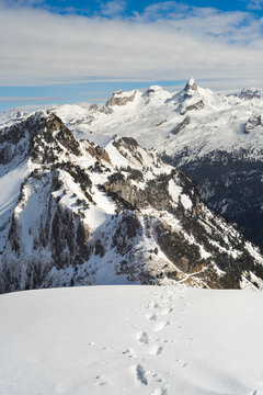 Winter landscape in the Swiss Alps with footprints in the foreground, Stoos, Switzerland