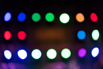 Multicolored defocused bokeh lights background.Multicolored defo