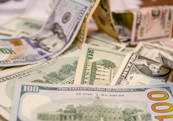 Various dollar notes as background