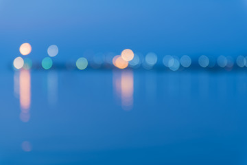 Abstract sparkling multicolor light defocused bokeh background