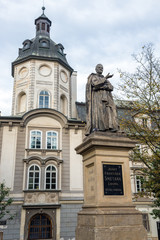 Fototapeta na wymiar Former Premonstratensian College Plzen and Church of St. Anna with Josef Smetana statue in Pilsen, Czech REpublic