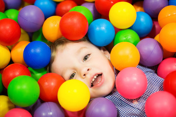Fototapeta na wymiar child, colored balls, the game
