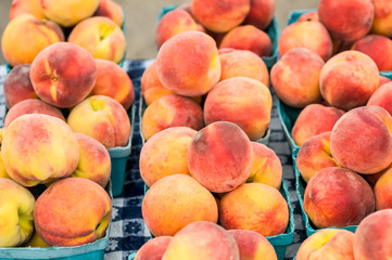 Peaches in Baskets on a Table