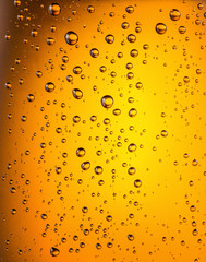 Water drops on glass of beer. Close up.