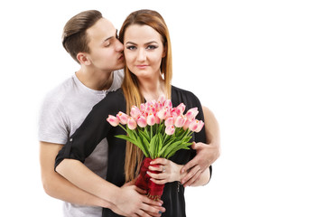 happy couple with a bouquet of tulips, valentines day theme