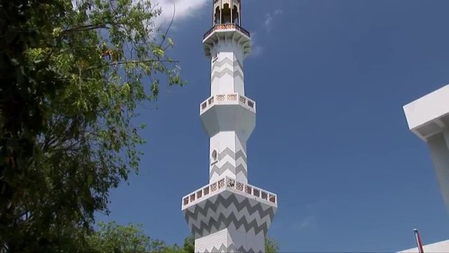 Tilt Shot Up Minaret Of The Masjid-al-Sultan Muhammad Thakurufaanu Al Auzam, Islamic Center In Male Maldives