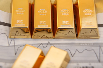 Gold bullion  isolated on japenese diary