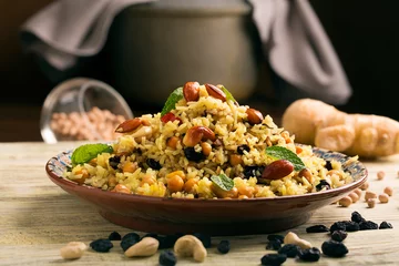 Aluminium Prints meal dishes Traditional dish of rice (pilaf) cooked with spices