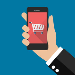 Hand holding smartphone with cart icon