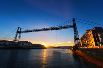 Fototapeta na wymiar Hanging bridge of Vizcaya at sunrise