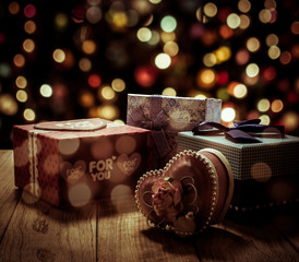 Gift boxes are on wooden plank