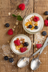 Yogurt with granola or muesli and fresh berries
