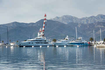 Naklejka premium Port of montenegro with yachts and moving sky and clouds