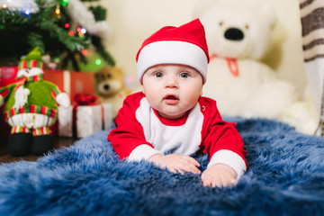 Baby dressed in Santa Claus