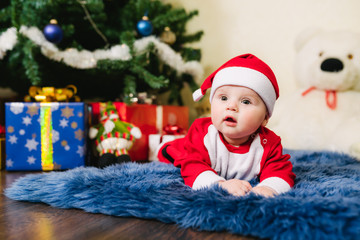 Baby dressed in Santa Claus