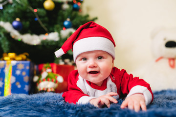 Baby dressed in Santa Claus