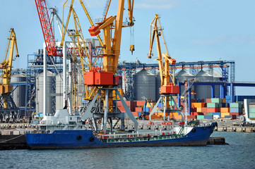 Bunker ship (fuel replenishment tanker) under port crane