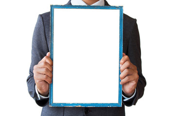 Businessman holding blank picture frame in vertical, portrait. isolated white background.