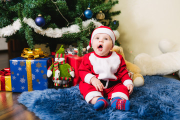 Baby dressed in Santa Claus