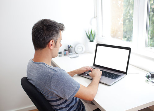 Young man working on laptop