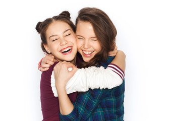 happy smiling pretty teenage girls hugging