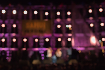 Fototapeta na wymiar Stage lights live concert colorful blurred background