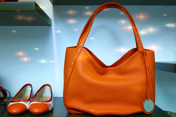 our stars: orange bag and shoes