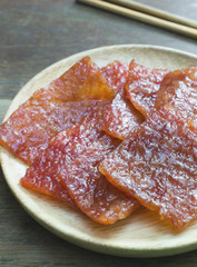 sliced sheets of dried and crispy pork
