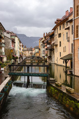 Fototapeta na wymiar Canal with sluice gate at medieval town of Annecy France