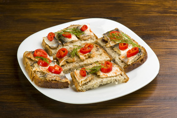 sandwiches with herring, red pepper and dill
