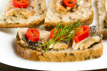 sandwiches with herring, red pepper and dill