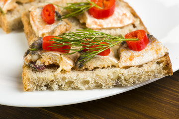 sandwiches with herring, red pepper and dill