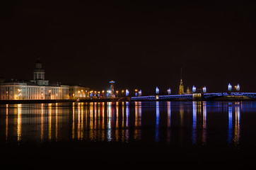 Fototapeta na wymiar Night illumination of the Palace Bridge in Saint Petersburg, Russia 