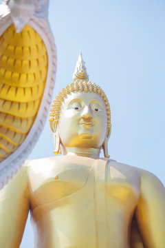 closeup big buddha and blue sky