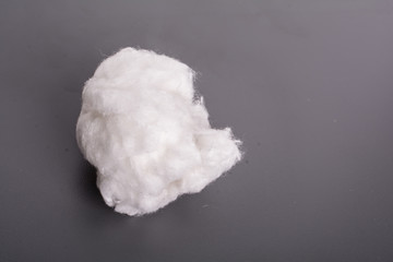 Cotton white ball against a dark background