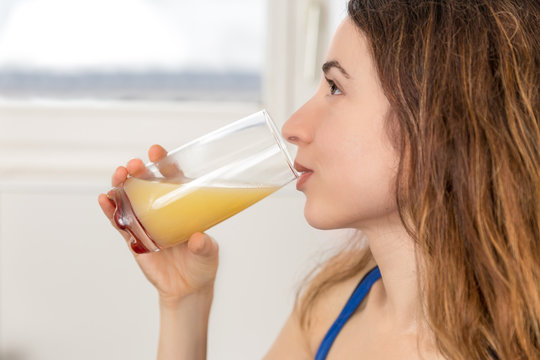 Woman enjoying her fresh fruit juice