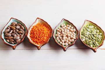 Healthy pulses products chick-pea, lentil, beans and peas, top view - obrazy, fototapety, plakaty