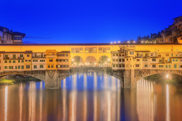 Fototapeta na wymiar View of medieval stone bridge Ponte Vecchio and the Arno River, Florence
