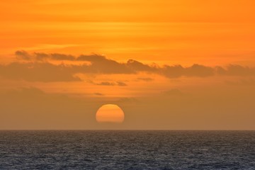 View on scenic orange sunset at sea