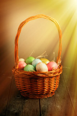 Colored easter eggs in basket