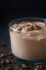 Fresh chocolate mousse. Black background.
