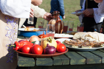 people having traditional countryside breakfast