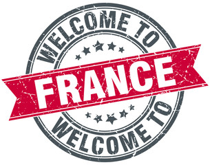 welcome to France red round vintage stamp