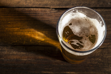 Glass and Bottles of Natural Beer