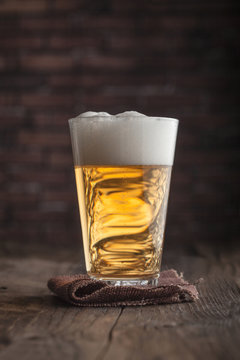 Glass and Bottles of Natural Beer