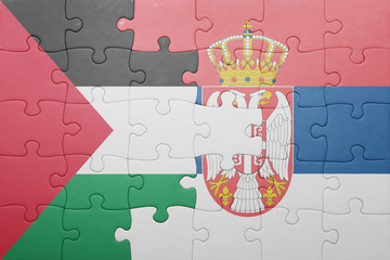 puzzle with the national flag of palestine and serbia . concept