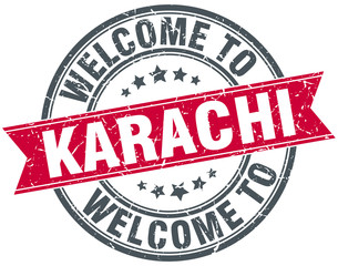 welcome to Karachi red round vintage stamp