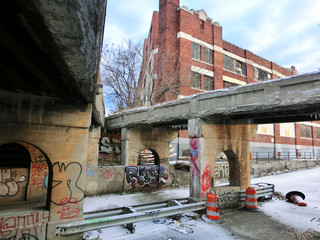 Urban Detroit, Michigan setting with crumbling architecture and filth - landscape color photo